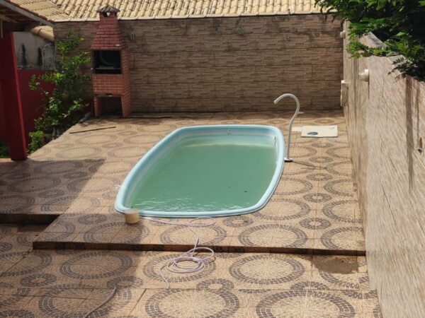 EXCELENTE IMÓVEL COM DUAS CASAS, PISCINA E ÁREA GOURMET – 360M² DE TERRENO