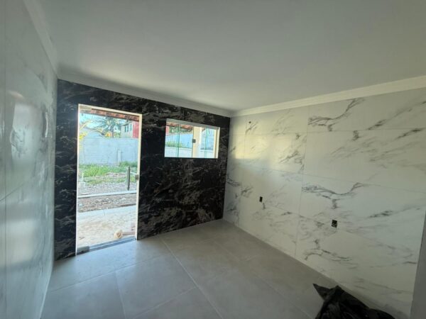 Excelente casa em terreno amplo, no bairro Cidade Nova por R$ 450.000.Aceita financiamento